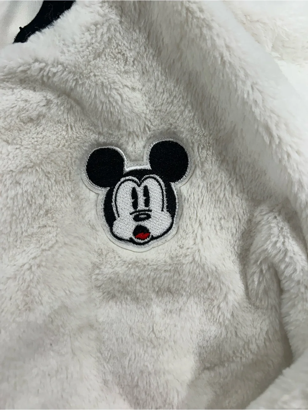 Disney White Faux Fur Bomber Jacket with Black Trim